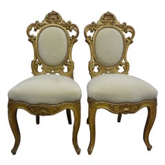 Pair of Italian Baroque Style Giltwood Chairs