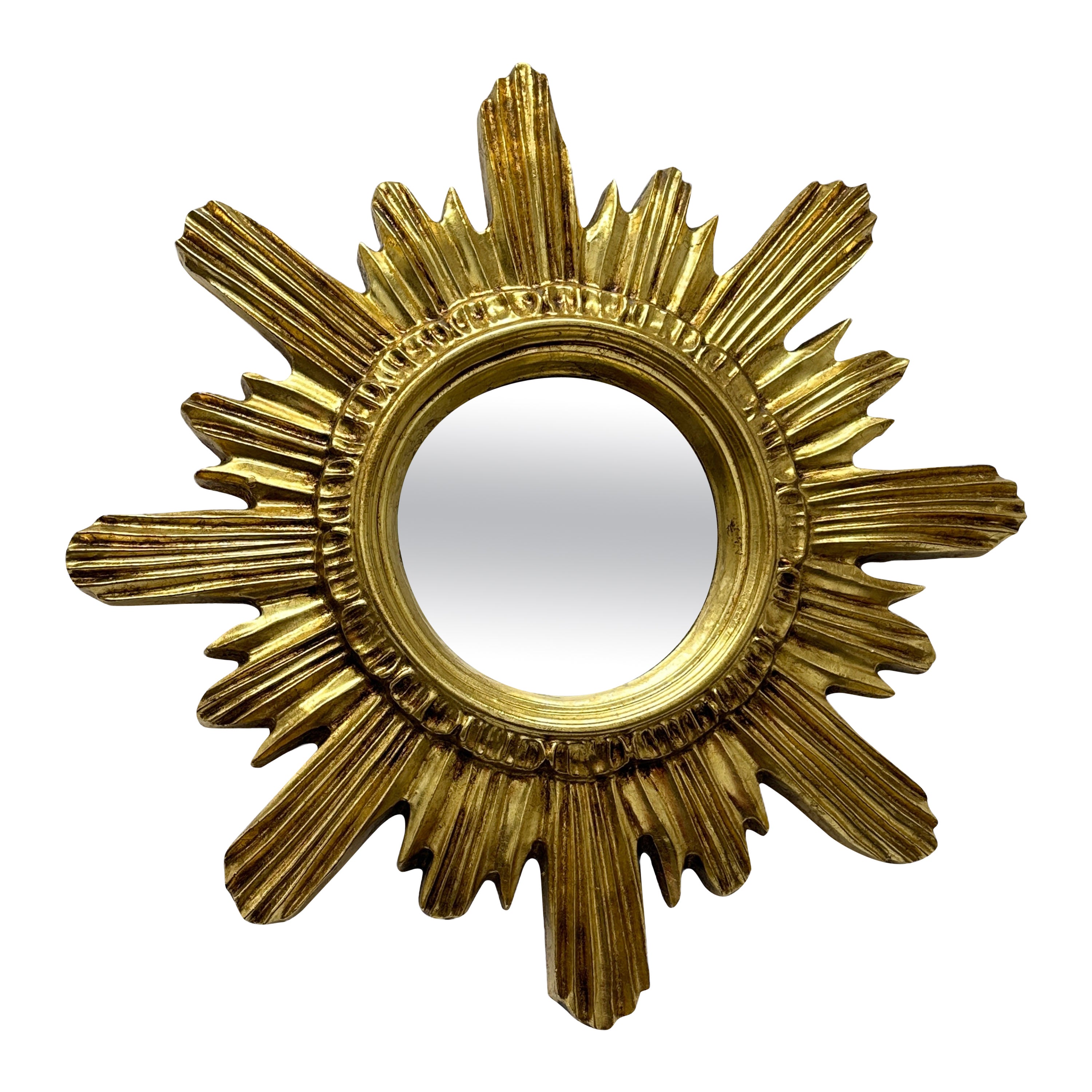Magnifique miroir doré en forme d'étoile rayonnante, vers 1980, fabriqué en Belgique en vente