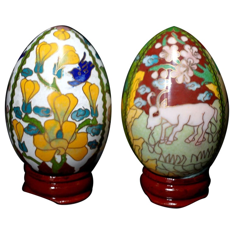 Two Chinese Cloisonné Enamel Eggs "Flowers and Animals" with Wood