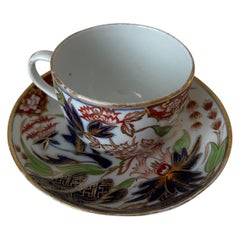 Coalport John Rose Taza de té y platillo con dibujo de dedos y pulgares