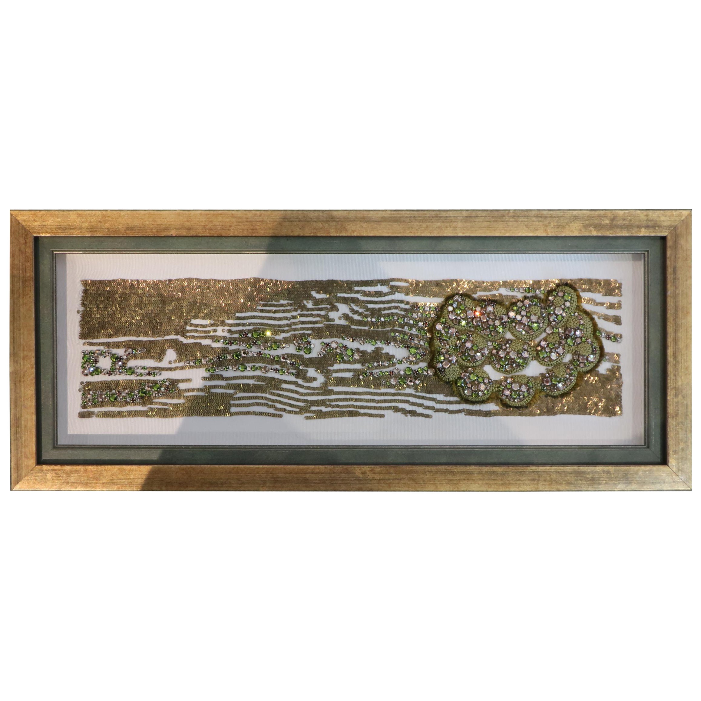 Swarovski crystal in peridot light colorado topaz with french knots and metal sequins in gold.