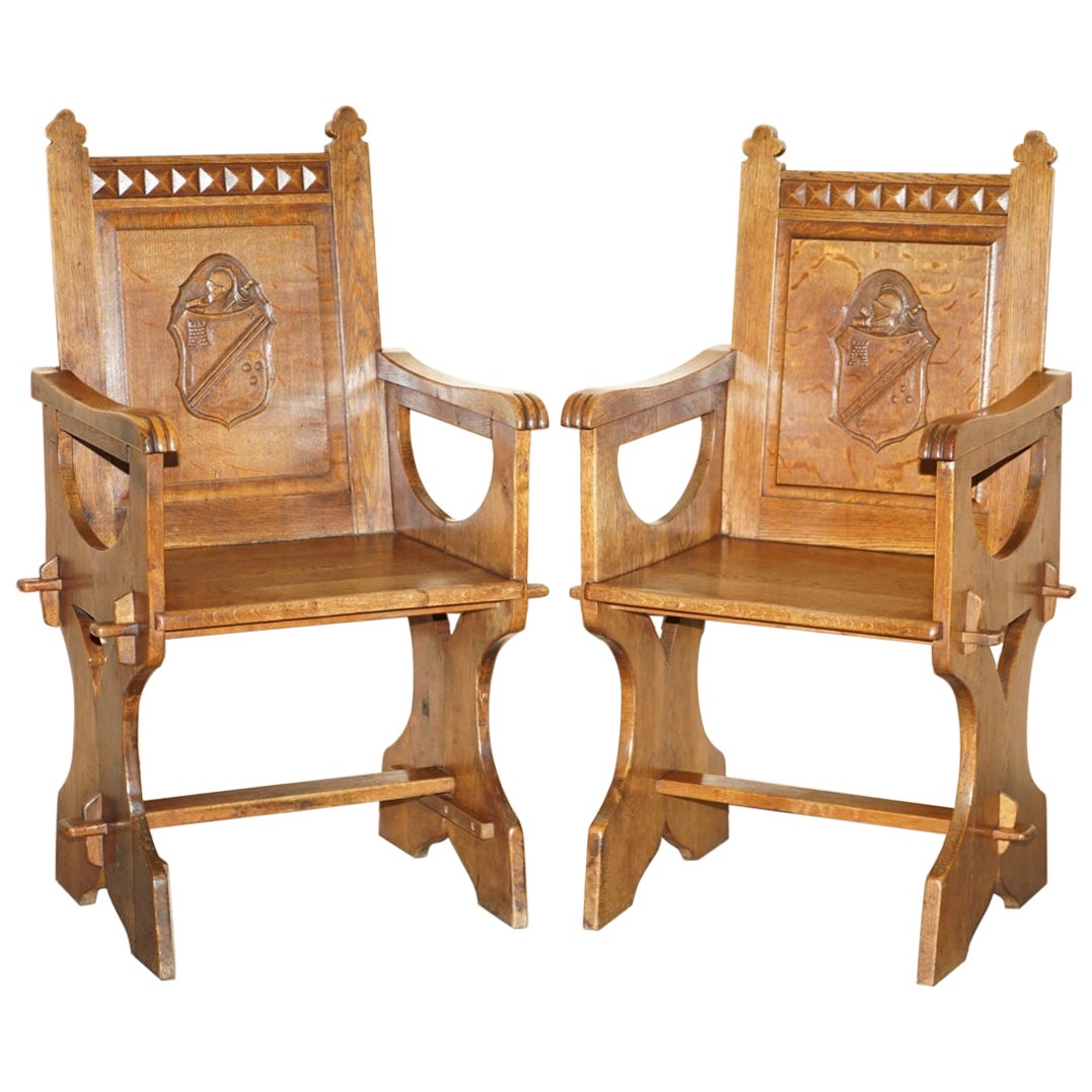 Pair of Antique Carved English Oak Armchairs with Armorial Crest Coat of Arms