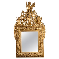 Early 18th Century Italian Carved Giltwood Mirror Depicting Four Seasons