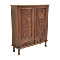 Used Cabinet from Germany with Hand Carved Motifs, circa 1930s