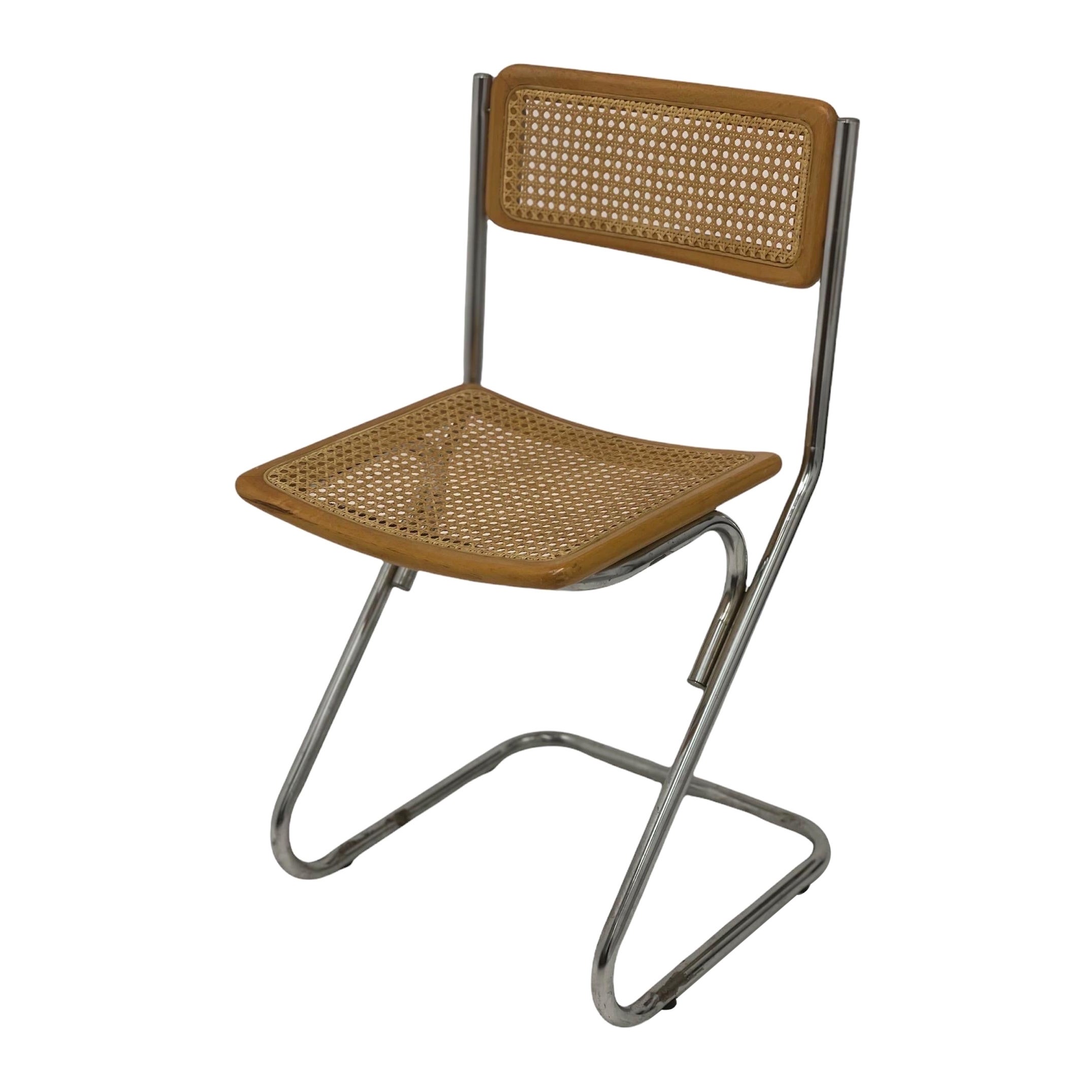Vintage Cane Metal Chair .
