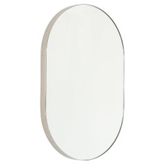 Miroir moderne en forme de pilier Capsula avec cadre en métal nickelé, moyen