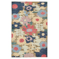 Tapis contemporain beige-brun avec motif floral polychrome de Rug & Kilim