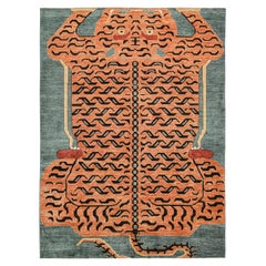 Tapis en peau de tigre personnalisé de Rug & Kilim avec pictogramme orange et marron