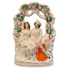 Ancienne figurine à dos plat du 19ème siècle du Staffordshire représentant une scène de mariage