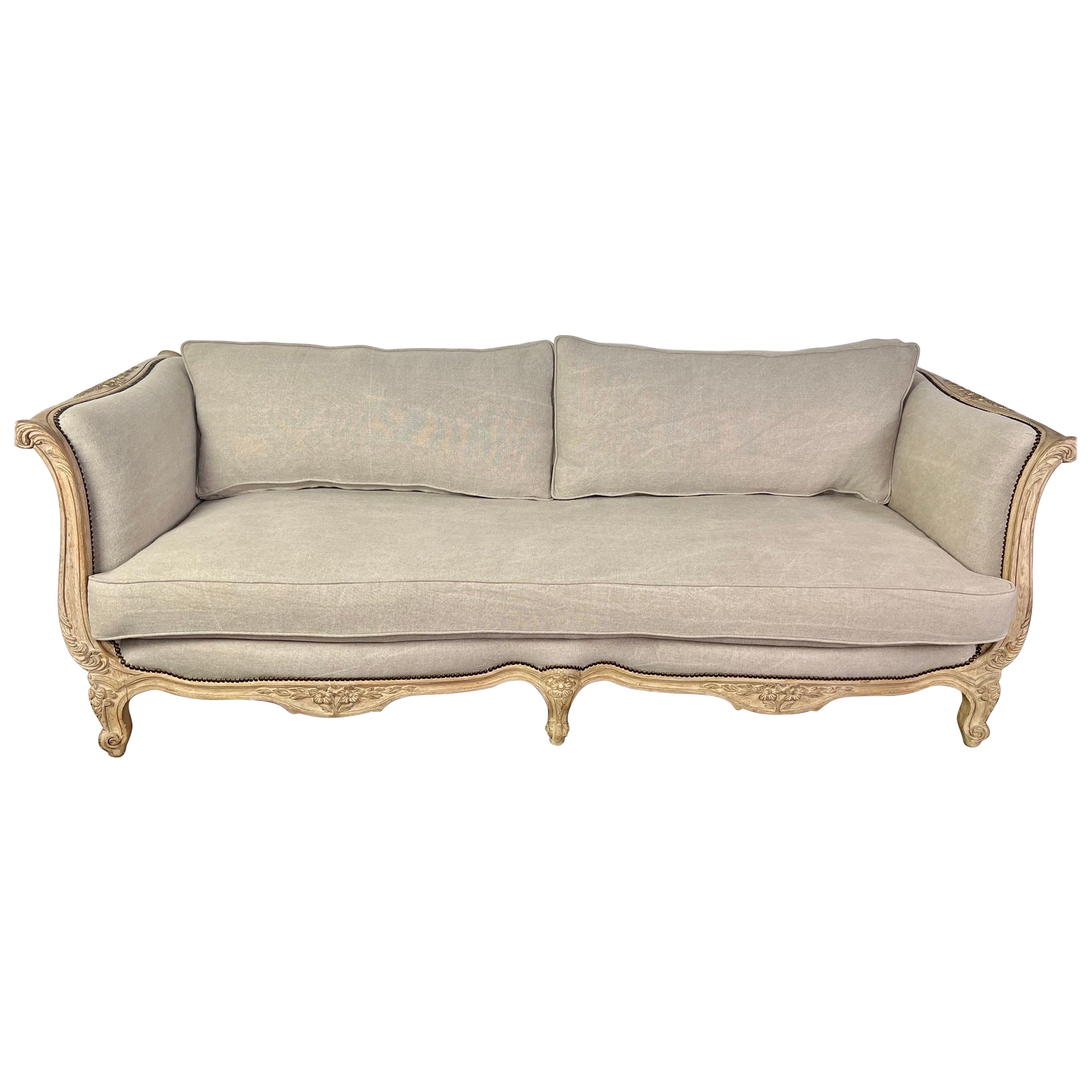 1930s French Carved Sofa with Linen Cushions 