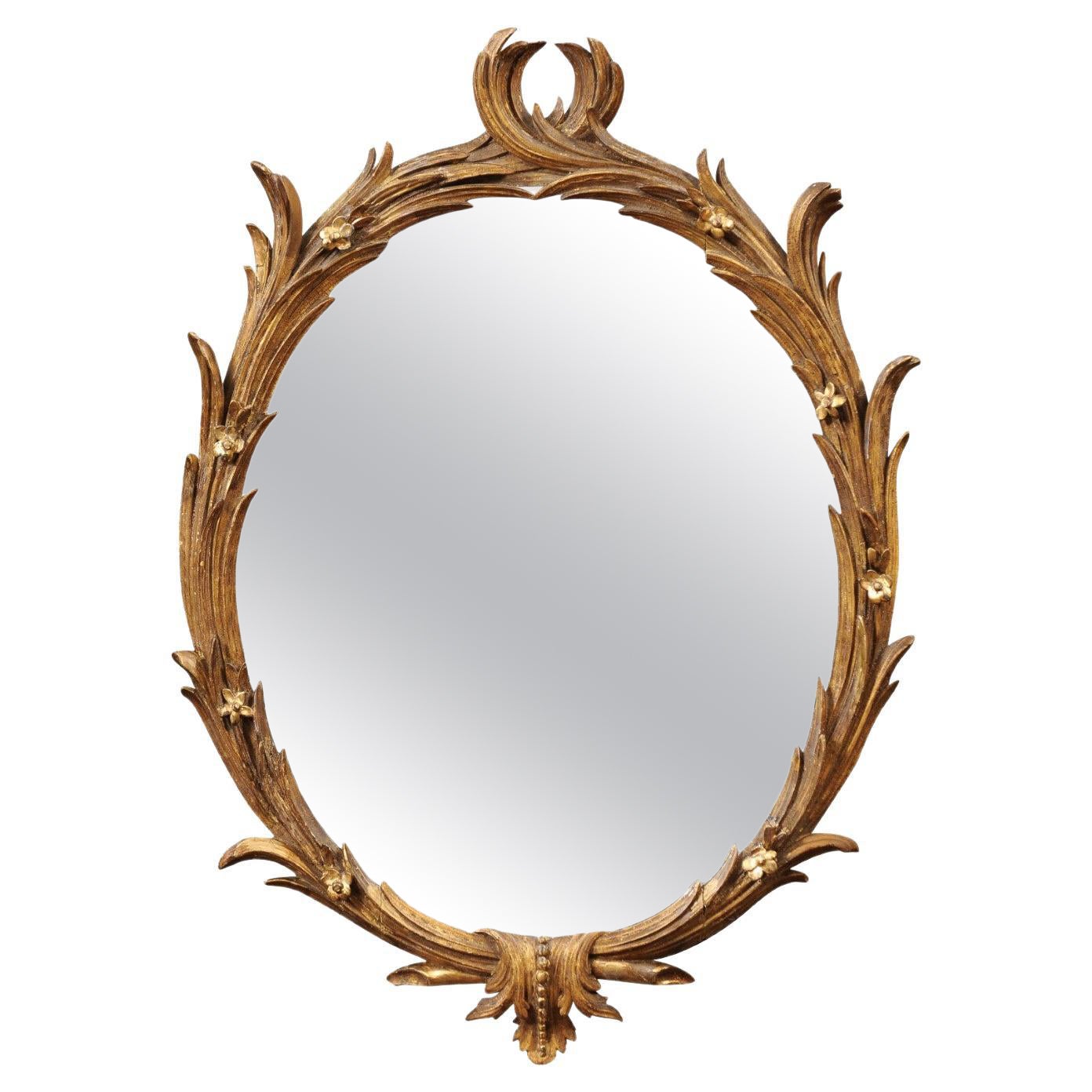 18th Century English Chippendale Oval Giltwood Mirror with foliage design