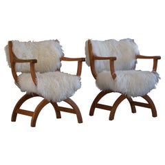 Pair of Armchairs in Oak & Sheepskin, Model "Kurul", Henning Kjærnulf, 1960s