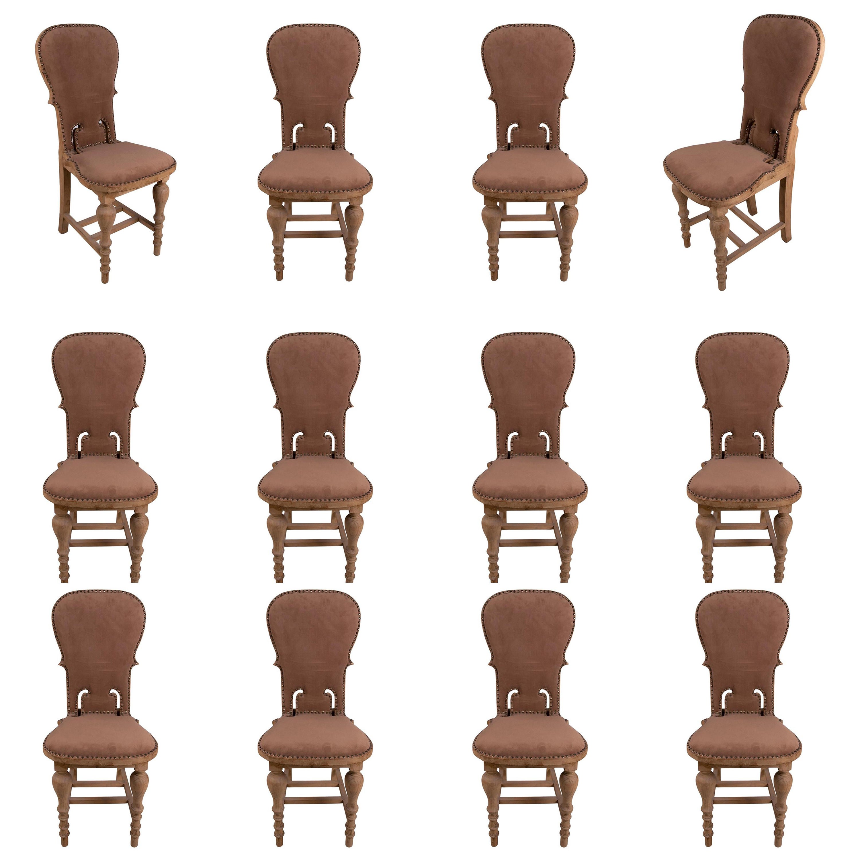 Set aus zwölf Stühlen in der Farbe des Holzes, gepolstert mit Ohrsteckern, 1950er Jahre
