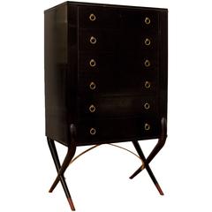 Ebonized Highboy Dresser with X Form Base and Brass Accents