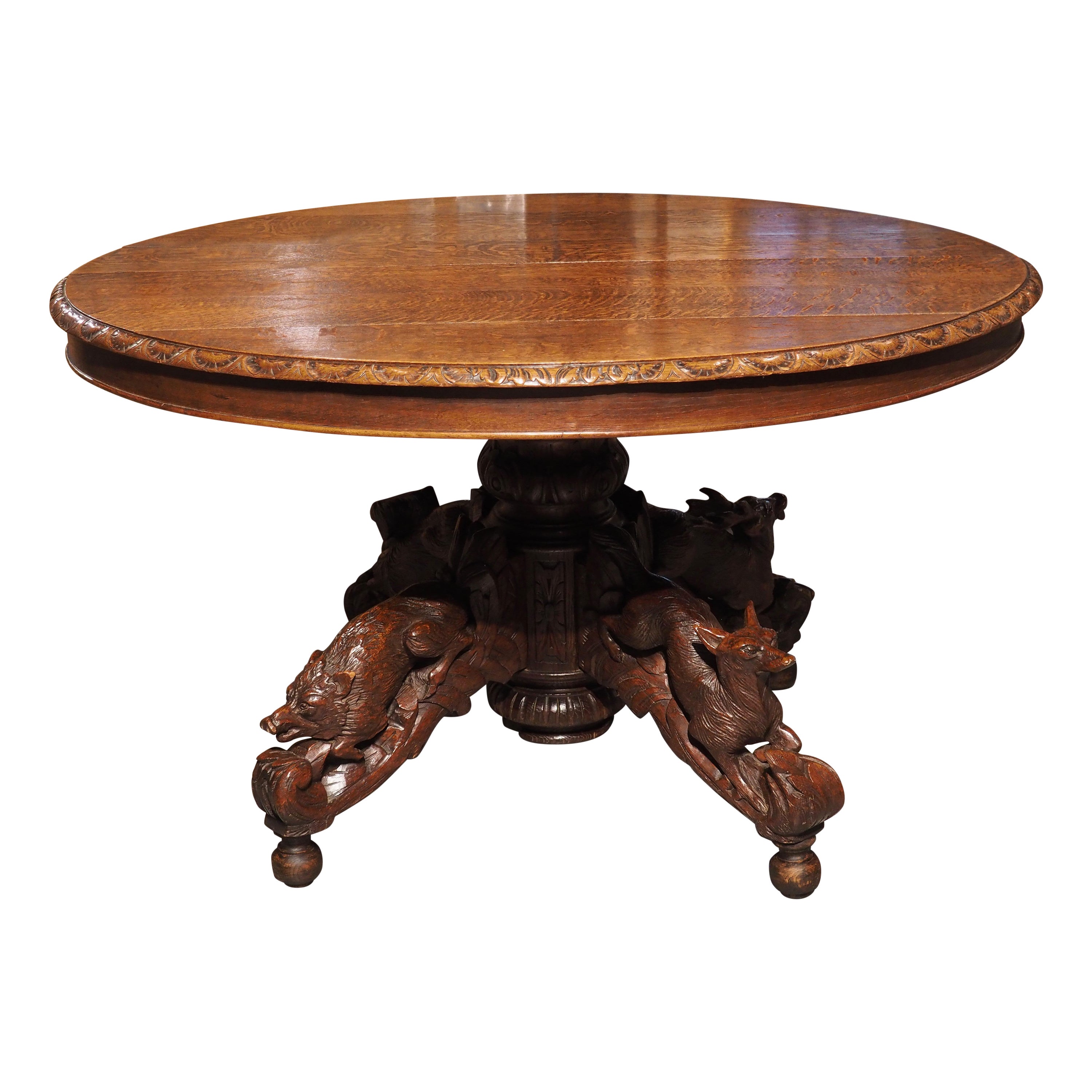 Antique Carved French Oak Oval Hunt Table with Boar, Dog, Fox, and Stag, c 1890 For Sale