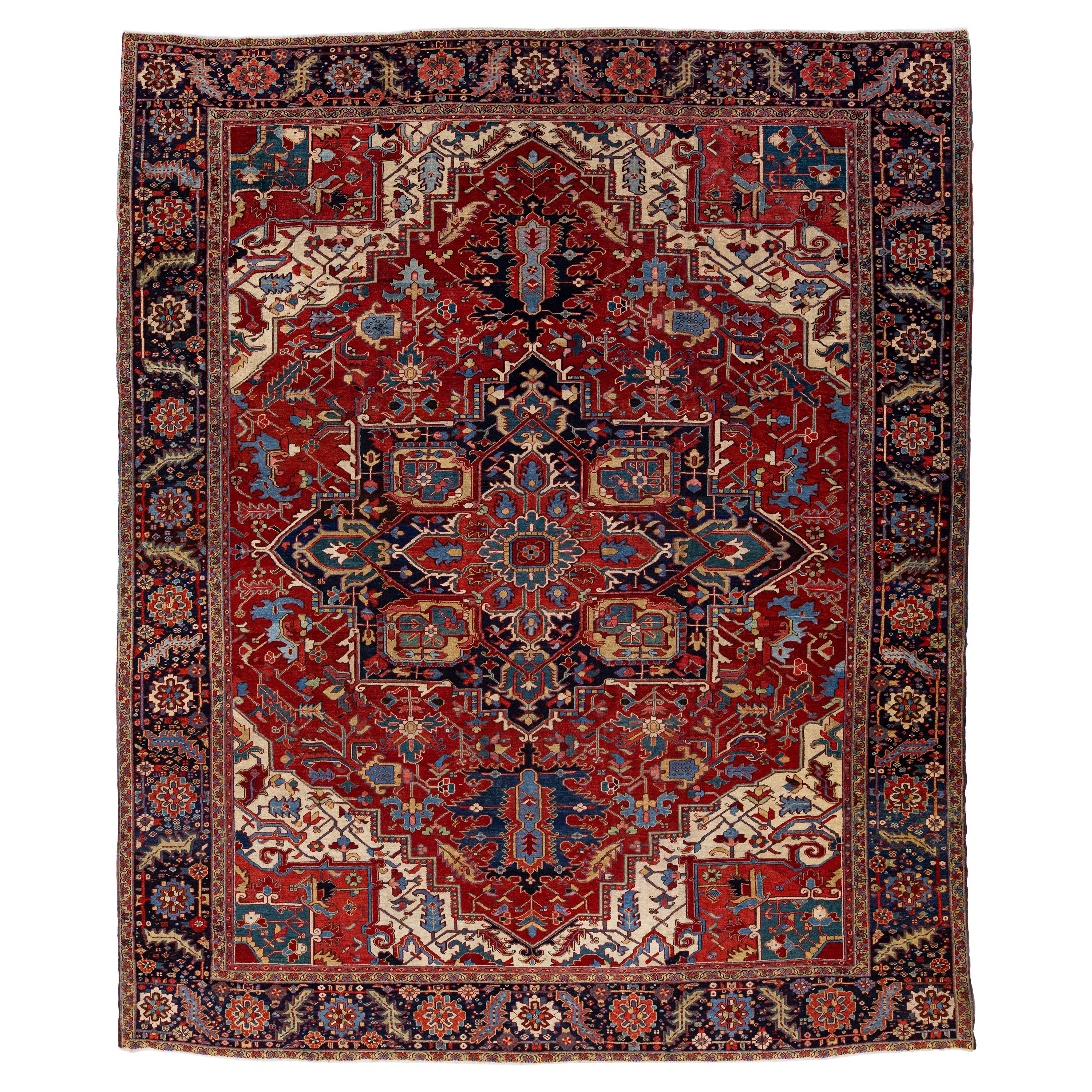 Antique Persian Heriz Wool Rug Handmade with Red Medallion Design For Sale