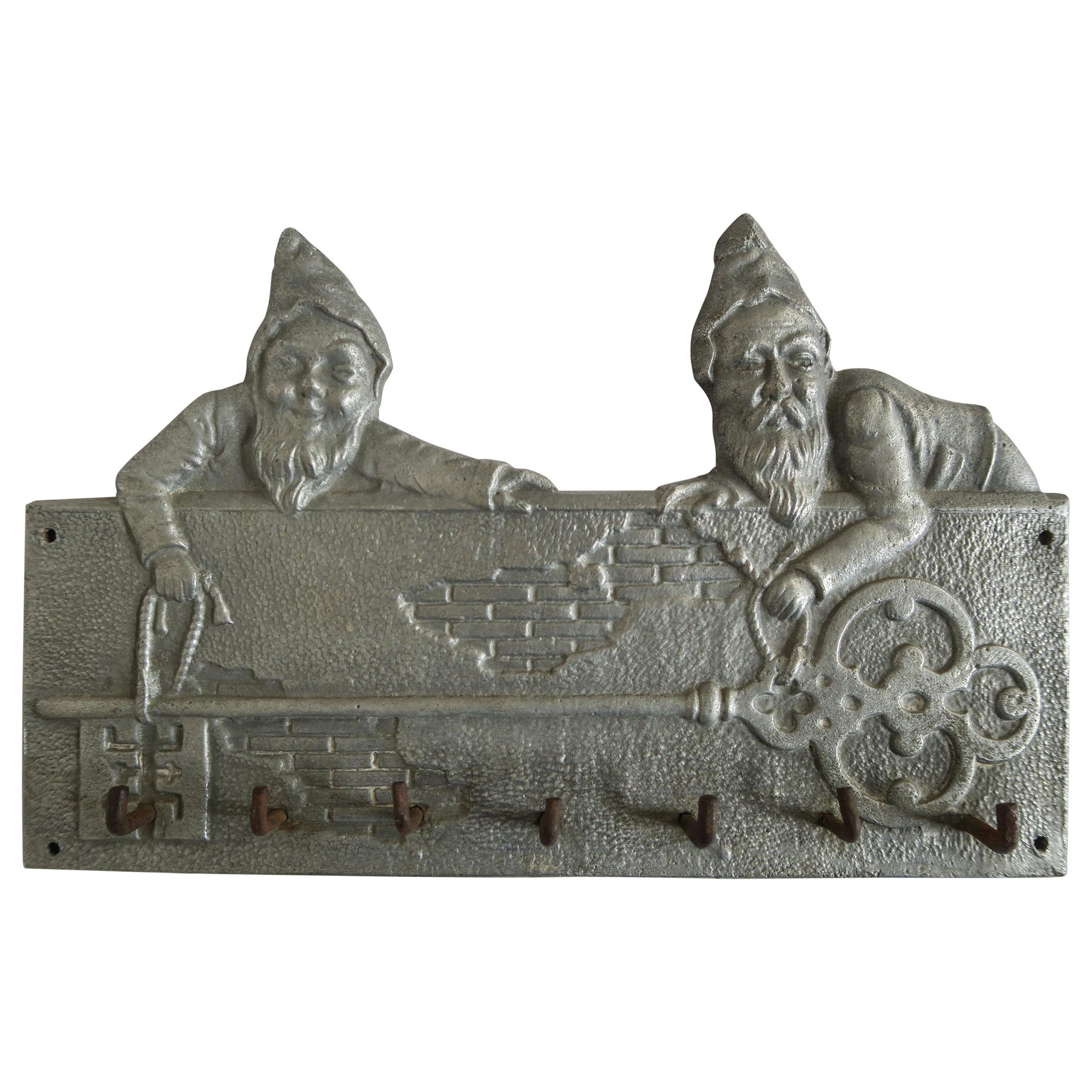 Jolly Aluminum and Iron Keyboard/Coat Rack with Two Dwarves For Sale