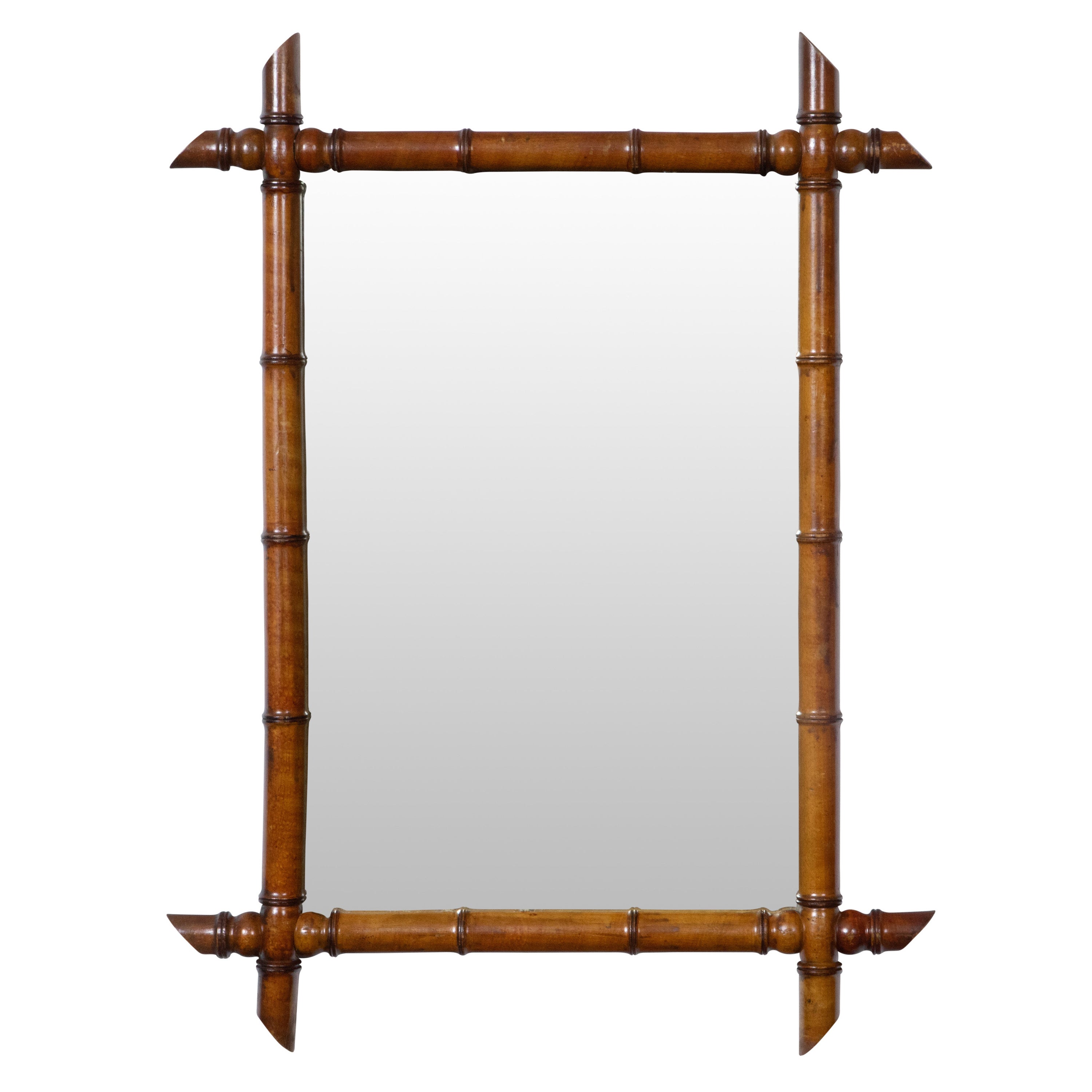 French Turn of the Century Brown Faux Bamboo Mirror with Intersecting Corners