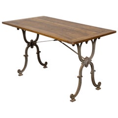 Table console française des années 1900 en acier et bois avec pieds incurvés en forme de X et traverse