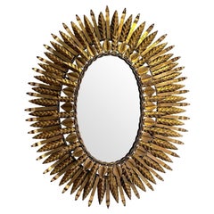 1950s Spanish Oval Wrought Iron Back Lit Sunburst Mirror