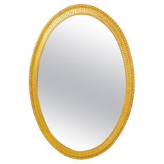 Large Neoclassical Oval Giltwood Mirror