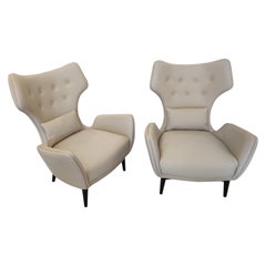 Pair of French greige Leather Armchairs