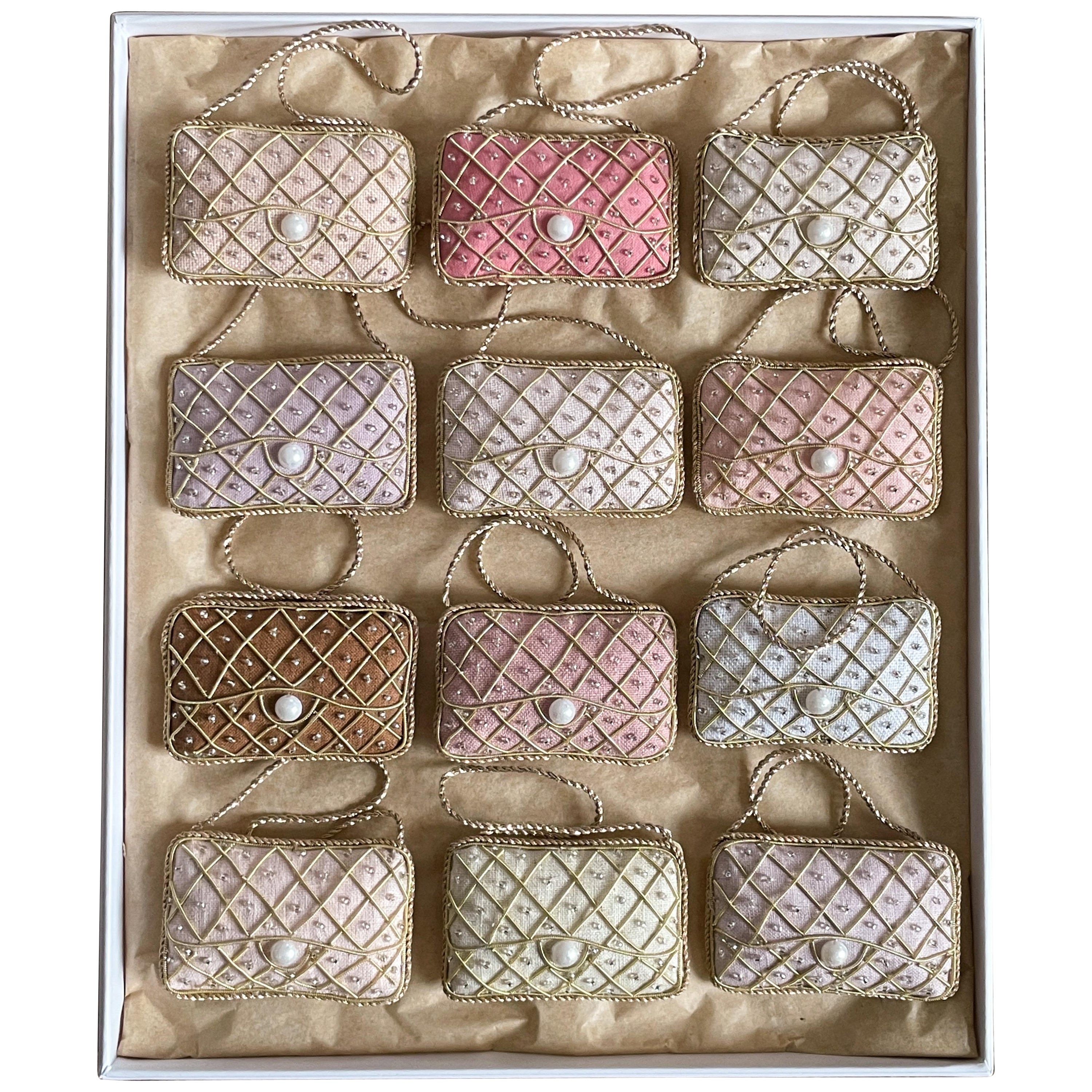 Set of 12 limited edition artisan Irish linen vintage quilted handbag Ornaments by Katie Larmour

This is a luxury box set of artisan made decorative ornaments created with authentic Irish Linen, exclusive to 1stdibs. They are special because they