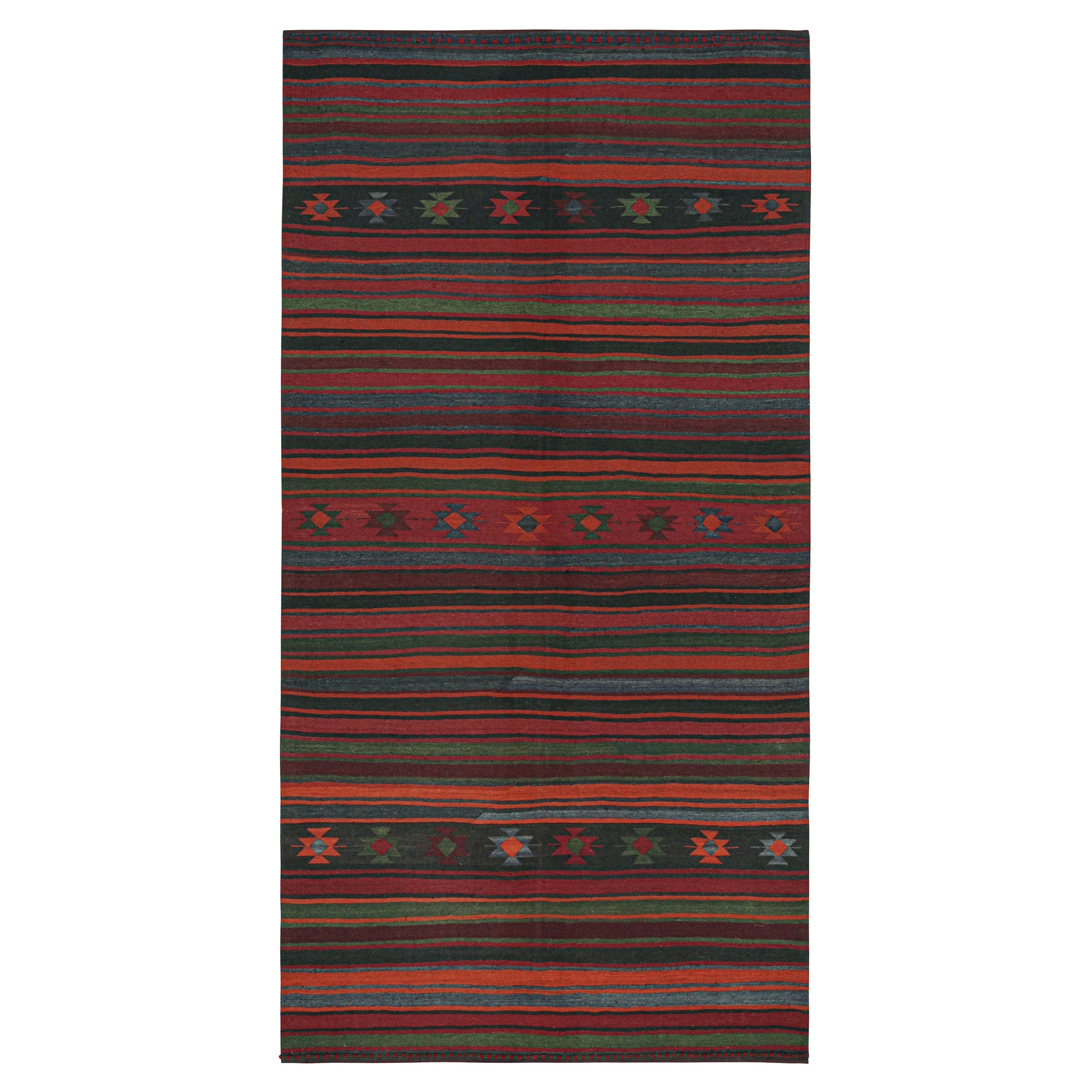 Persischer Kelim in Burgunderrot mit polychromen Streifen von Teppich & Kilim
