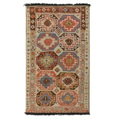 Rug & Kilim’s Tribal-Style Runner in Beige with Blue and Red Medallions