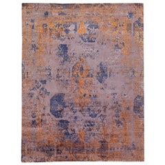 Tapis abstrait en laine et soie fait à la main en bleu et orange 