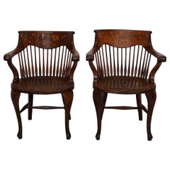 Pair of English Edwardian Oak Spindle Back Captains Office Desk Chairs