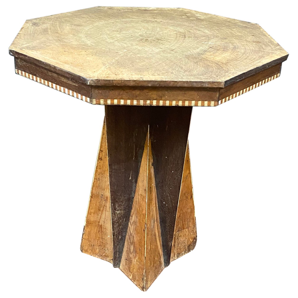 Interesante mesa africanista de pedestal Art Decó, hacia 1930