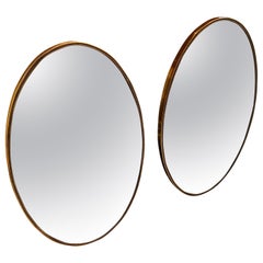 1960s Set of Two Giò Ponti Style Mid-Century Modern Solid Brass Mirrors (Jeu de deux miroirs muraux en laiton massif de style Giò Ponti)
