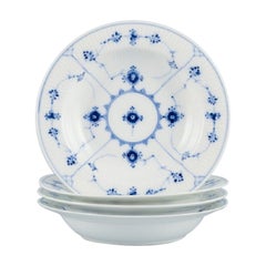 Royal Copenhagen, Blue Fluted Plain, a Set of Four Deep Plates in Porcelain