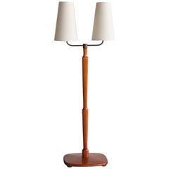 Swedish Modern Two Arm Floor Lamp in Teak Wood and Brass, Sweden, Late 1940s
