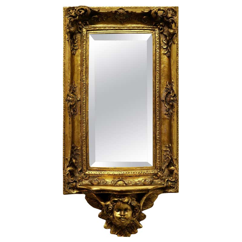 Shaped Rococo Style Gilt Wall Mirror For Sale at 1stDibs