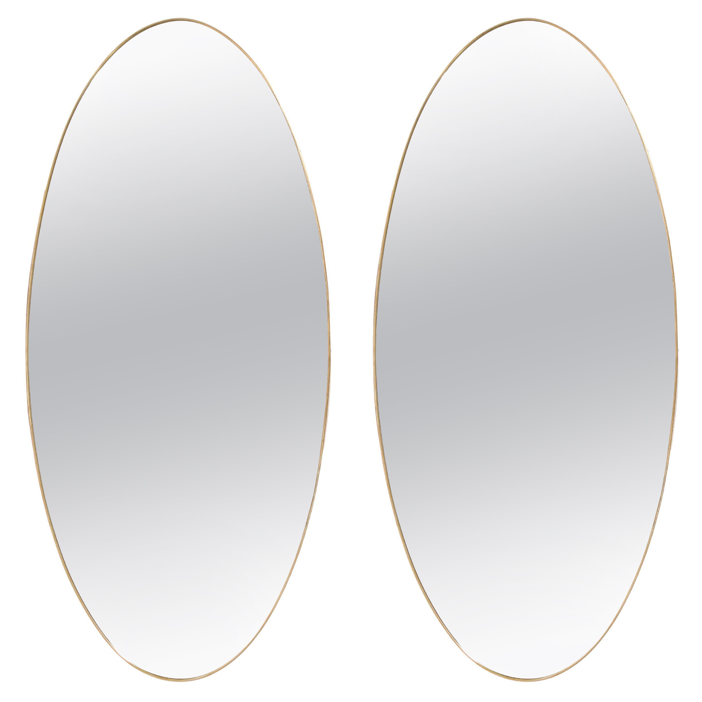 1950s Italian Rare Pair of Grand Scale Oval Brass Mirrors (Paire de miroirs ovales en laiton)