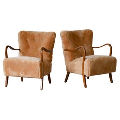 Pair of Danish 1940s Low Back Easy Chairs in Amber Shearling with Open Armrests
