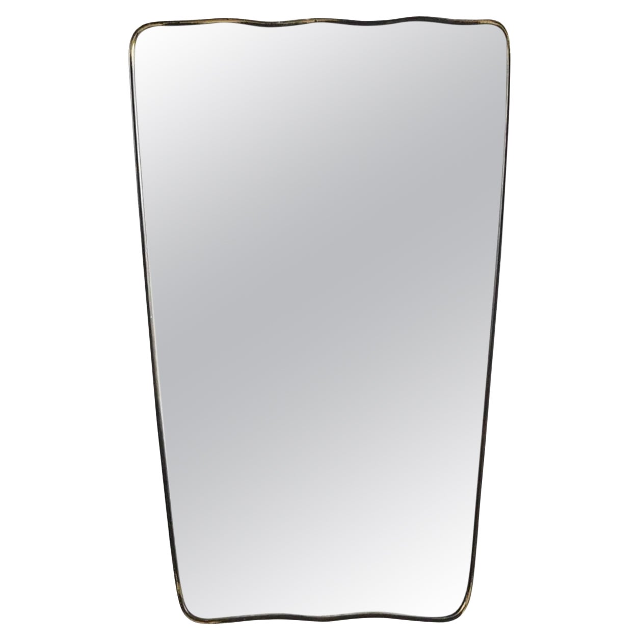 Italian wall mirror, produced in Italy, 1950s by Gio Ponti. Organically cut mirror glass in framed brass and shows patina. 

Other designers of the period include Fontana Arte, Max Ingrand, Franco Albini, and Josef Frank.