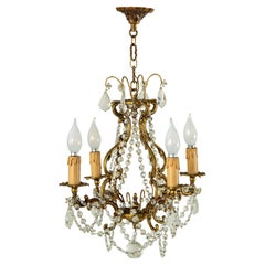 Lampadario francese in bronzo e cristallo di strass dei primi del Novecento, di piccole dimensioni