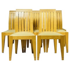 Vintage Set of 8 Dining Chairs in Blonde Wood and Leather Upholstery.