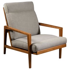 Edward Wormley for Dunbar Tilt-Back Sheridan Lounge Chair in Walnut Cane & Brass