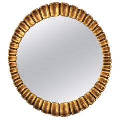 Giltwood Oval Sunburst Mirror by Francisco Hurtado