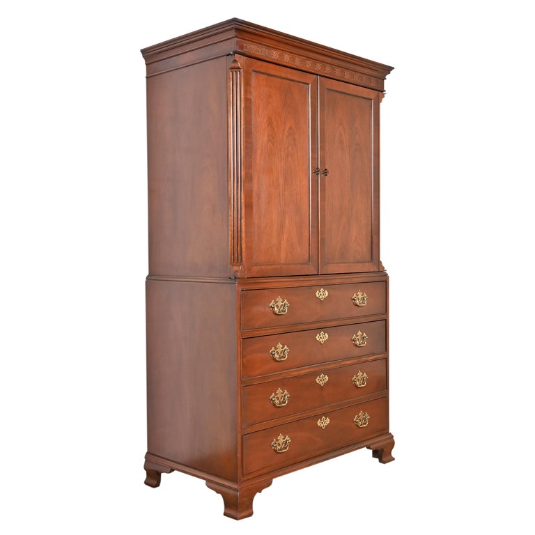 Baker Furniture Carved Mahogany Armoire Chest Of Drawers or Linen Press For Sale at 1stDibs