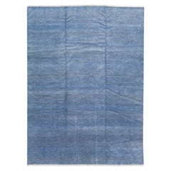 Tapis moderne en laine bleu Savannah avec motif géométrique