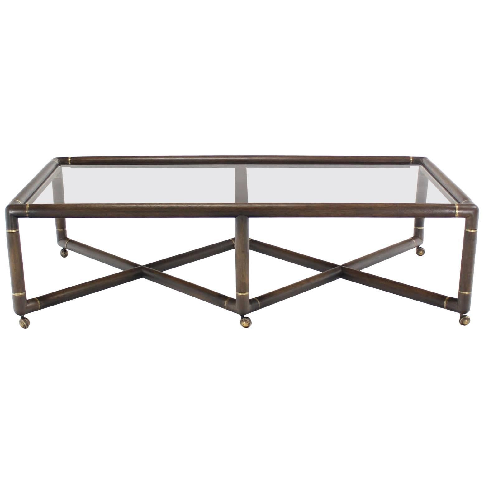 Double X Base Glass Top Rectangular Coffee Table on Wheels  For Sale