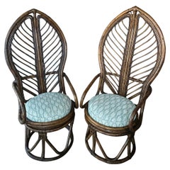 Paire de fauteuils pivotants vintage Palm Beach en rotin avec feuilles de feuilles, nouvellement tapissés 