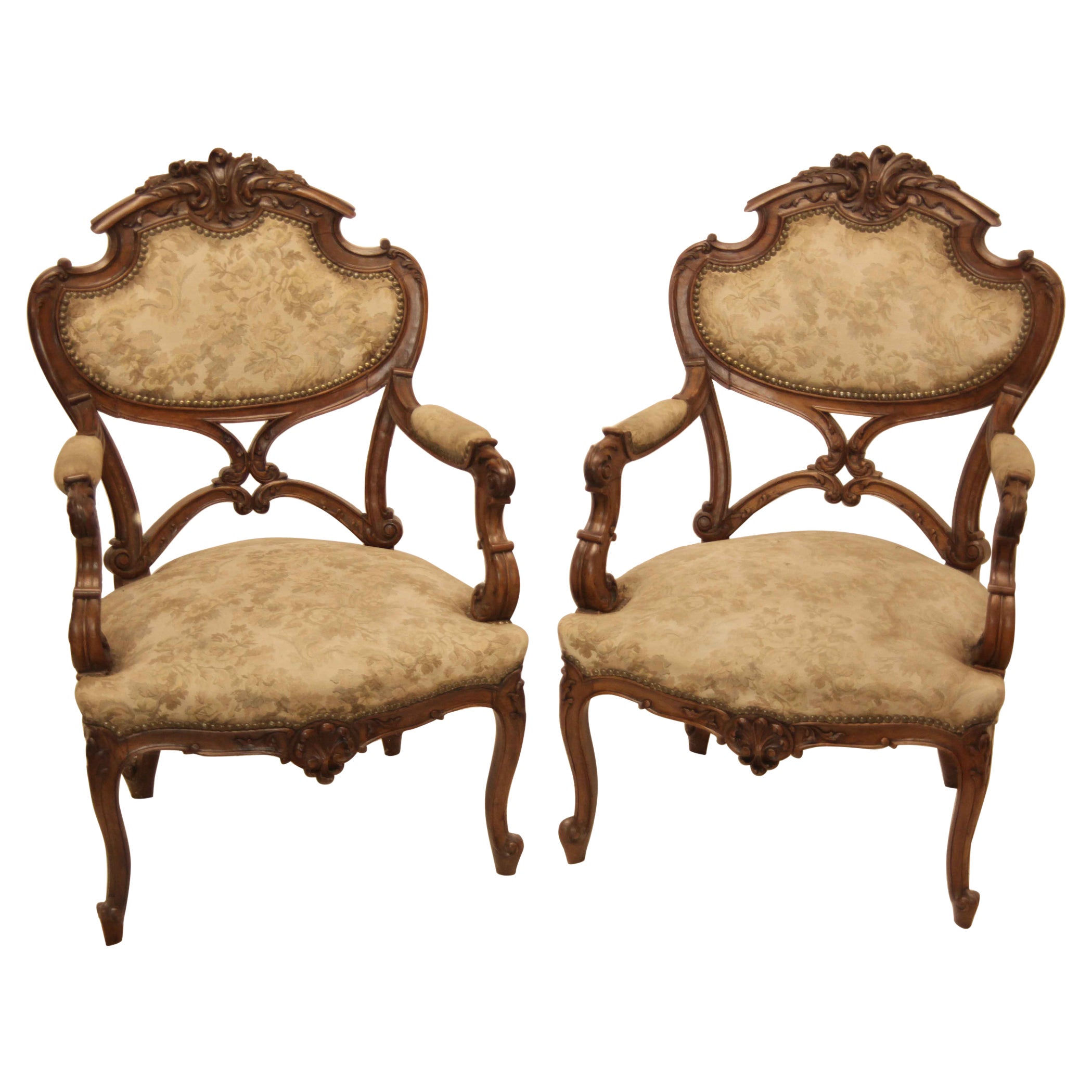 Pair of French Carved Walnut Armchairs For Sale