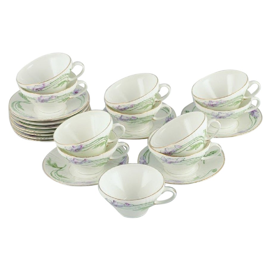 Rörstrand, Sweden, a Set of Eleven Art Nouveau Porcelain Teacups with Saucers