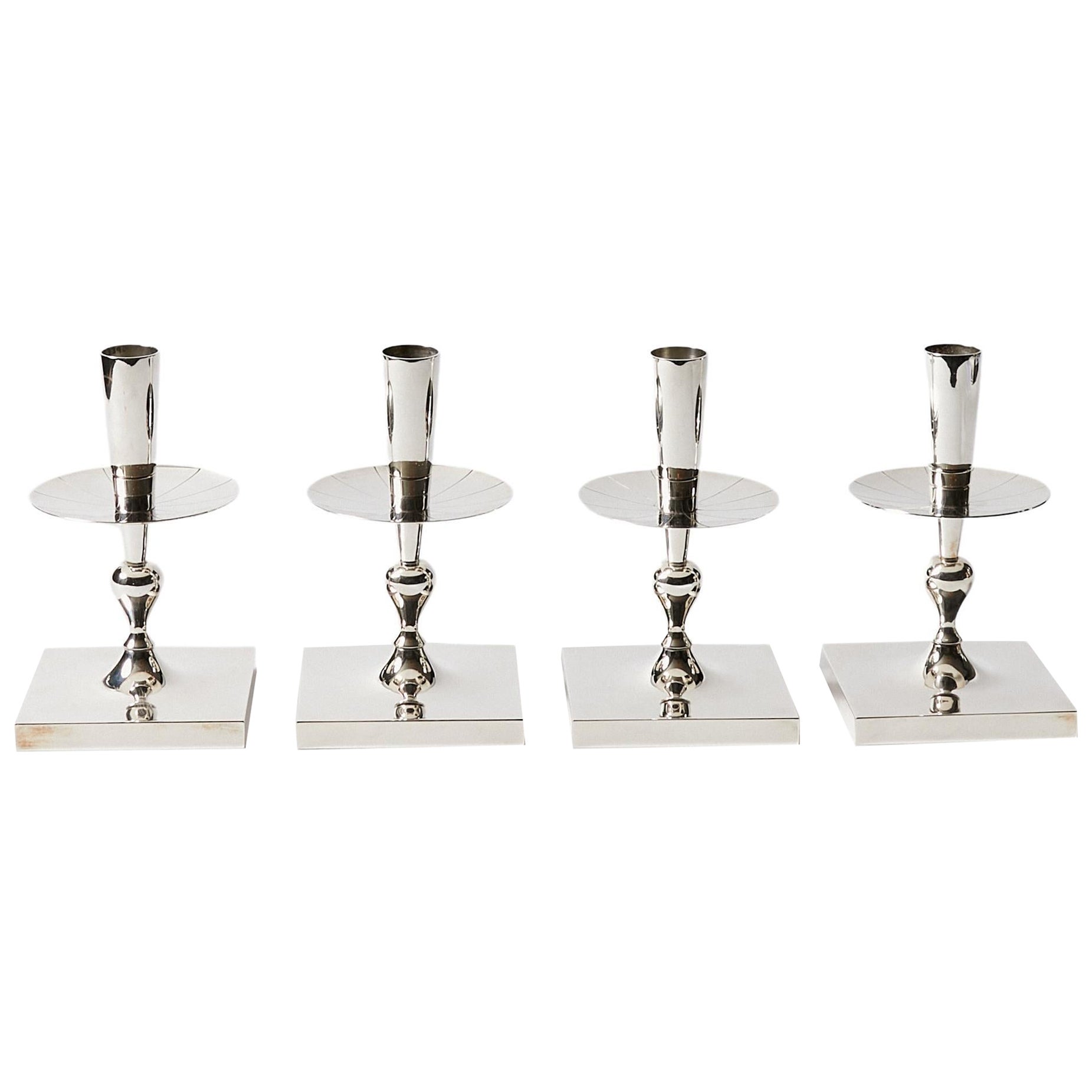 Set of Four Candle Sticks by Tommi Parzinger for Dorlyn Silversmiths For Sale